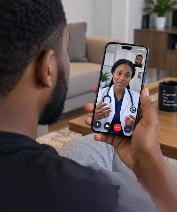 A patient holding a phone during a video call with a Tangent doctor